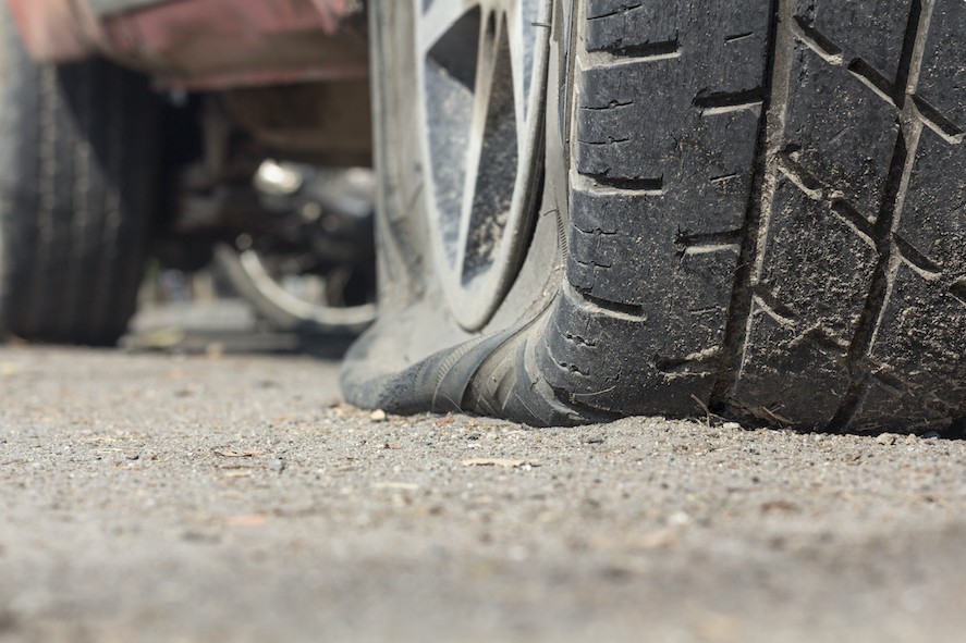 flat tire on road 