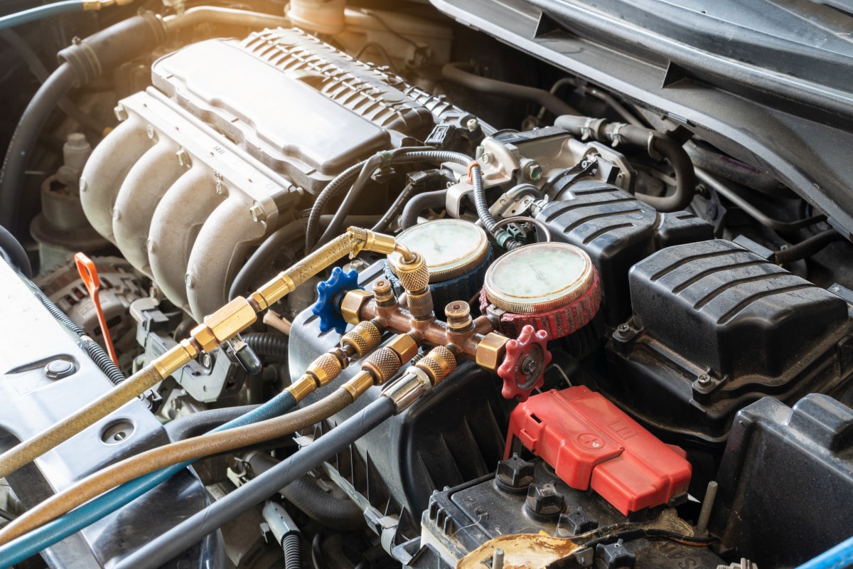 pressure gauges under the hood of a car 