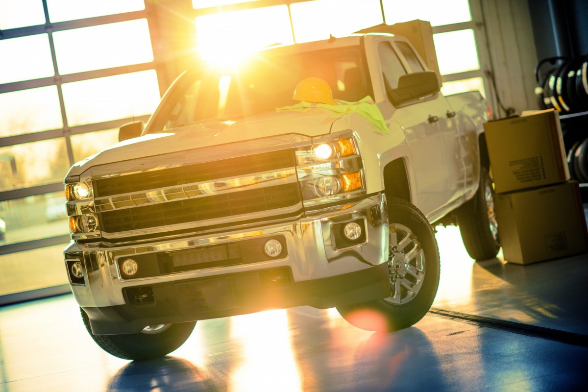 truck in showroom with sun showing through the window