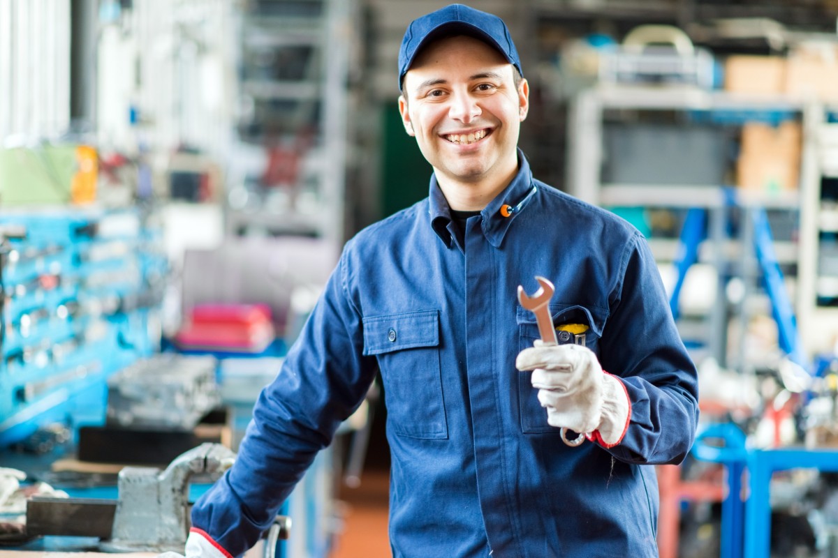 mechanic holding a wrench